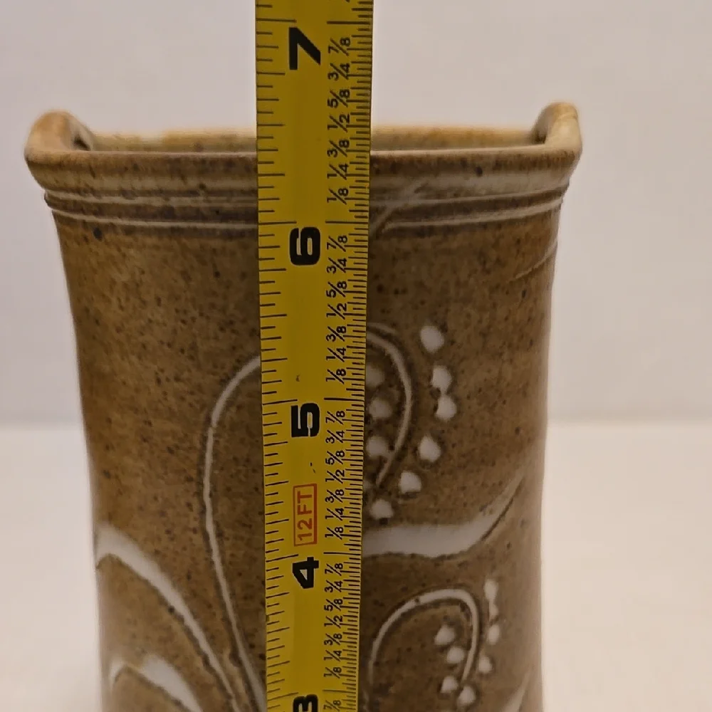 Brown Signed Pottery Vase with White Floral Design